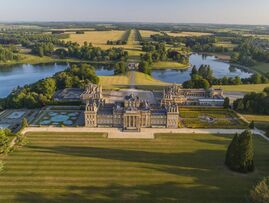 Photograph of Blenheim palace taken from the sky, showing the grounds surrounding the palace building. 